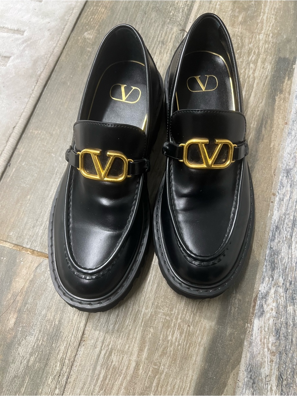 Valentino Garavani Black Leather Loafers with Gold V Buckle